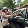 Operasi Zebra Candi 2025, Satlantas Polres Tegal Bagikan Helm SNI dan Stiker